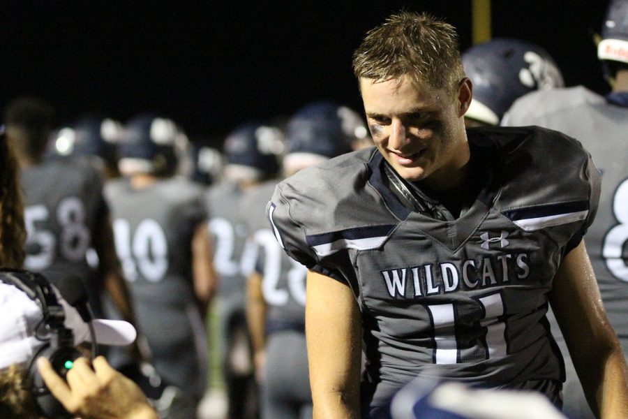 Junior Alex Edmondson faces the crowd at the end of the second quarter.