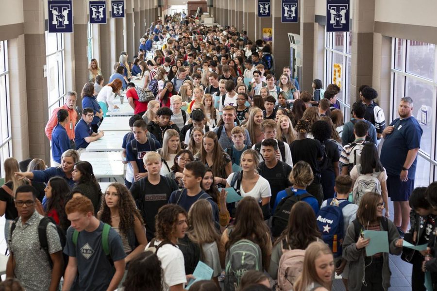Students clamor through the hallways toward class on the first day of school. “It’s like being stuck in traffic,” sophomore Katelin Callahan said. “You can feel everyone else’s body heat, and someone’s always breathing down your neck and bumping into your backpack.” The additional construction planned for 2020 was intended to accommodate the oversized student body.