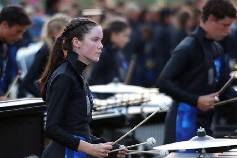 As+the+marching+band+roars+behind+her%2C+Abby+Cascarelli+plays+the+marimba+at+the%0ALangham+Creek+football+game.+%E2%80%9CI+love+everyone+in+the+front+ensemble+and+performing+with%0Athem+is+exhilarating.%E2%80%9D+The+Wildcats+won+the+football+game+and+have+only+lost+one+game+this%0Ayear.