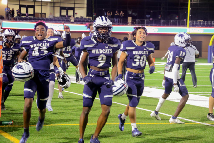 Wildcat players run off the field after their victory