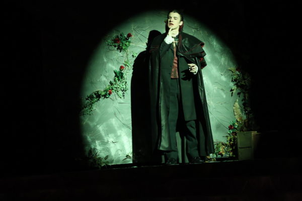 Kellen Highfield enters a scene as Dracula