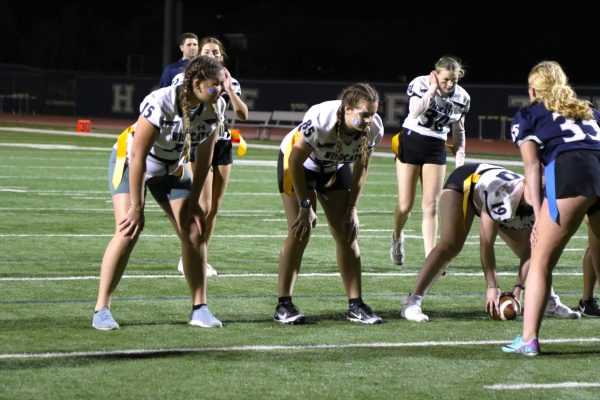 Foreign exchange students juniors Lena Trojer and Mia Petsch participate on the O Line during the game. 